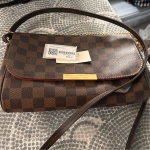 Louis Vuitton wallet on a chain